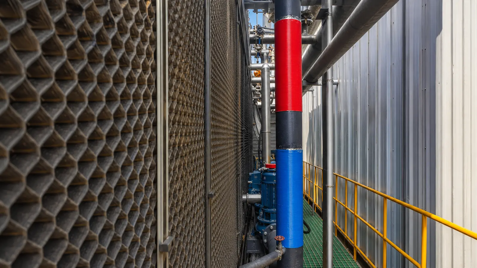 WEHA installation on a vertical cooling-tower main